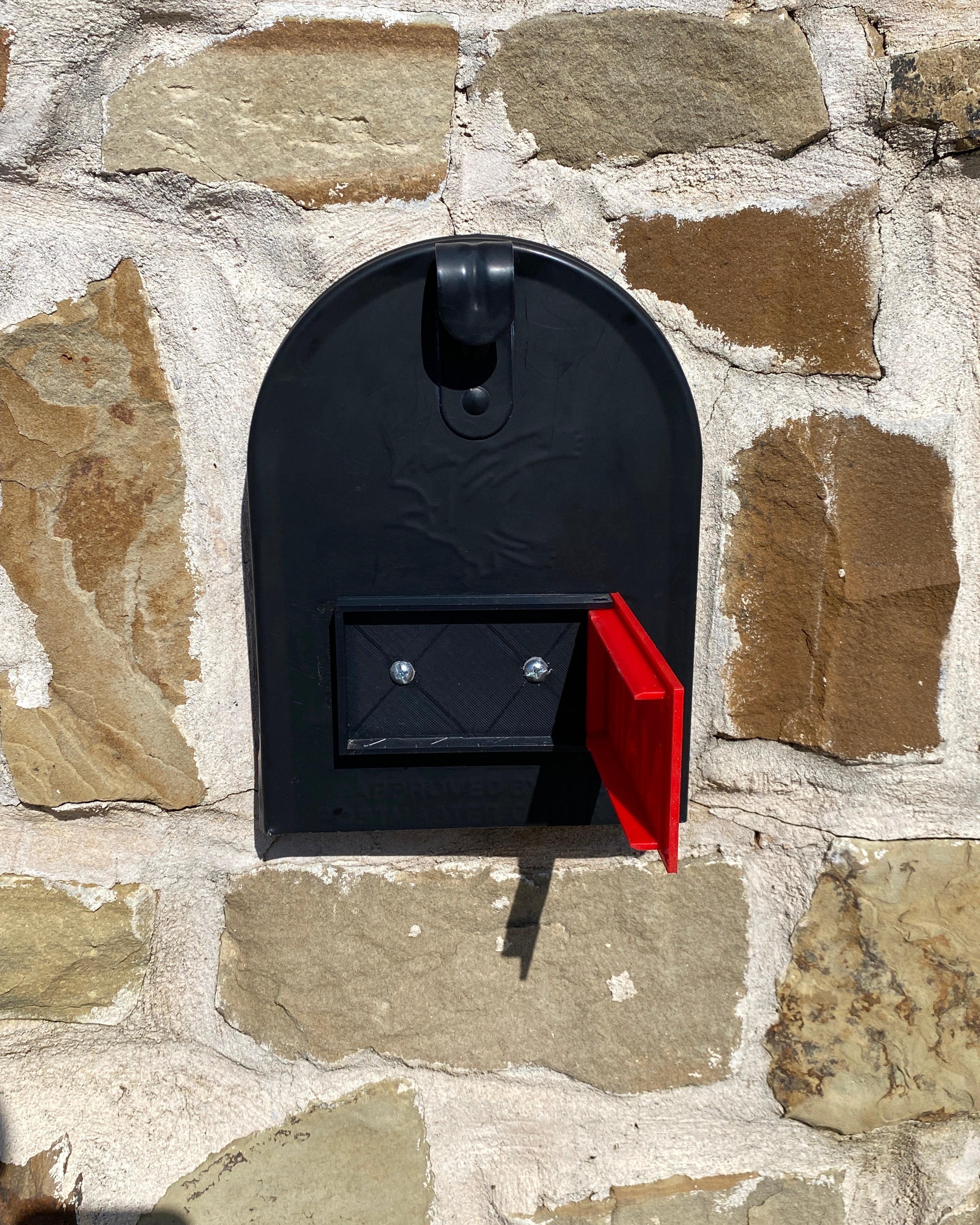 mailbox flag for brick or stone mailboxes front mounted on a mailbox in an open position.